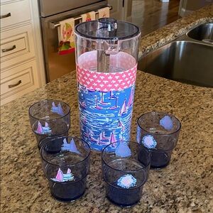 New in box Lilly Pulitzer Pitcher with 4 cups.  Acrylic.